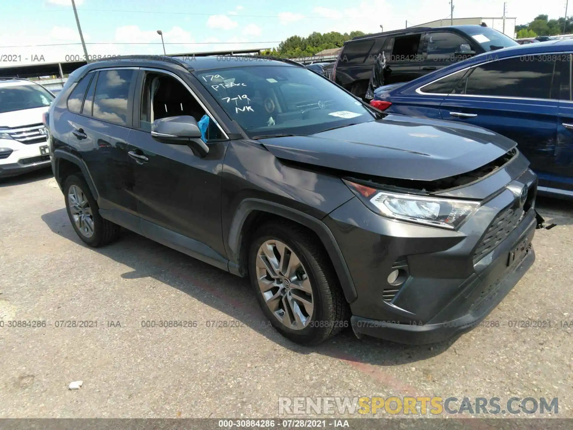 1 Photograph of a damaged car JTMC1RFV3KJ014067 TOYOTA RAV4 2019