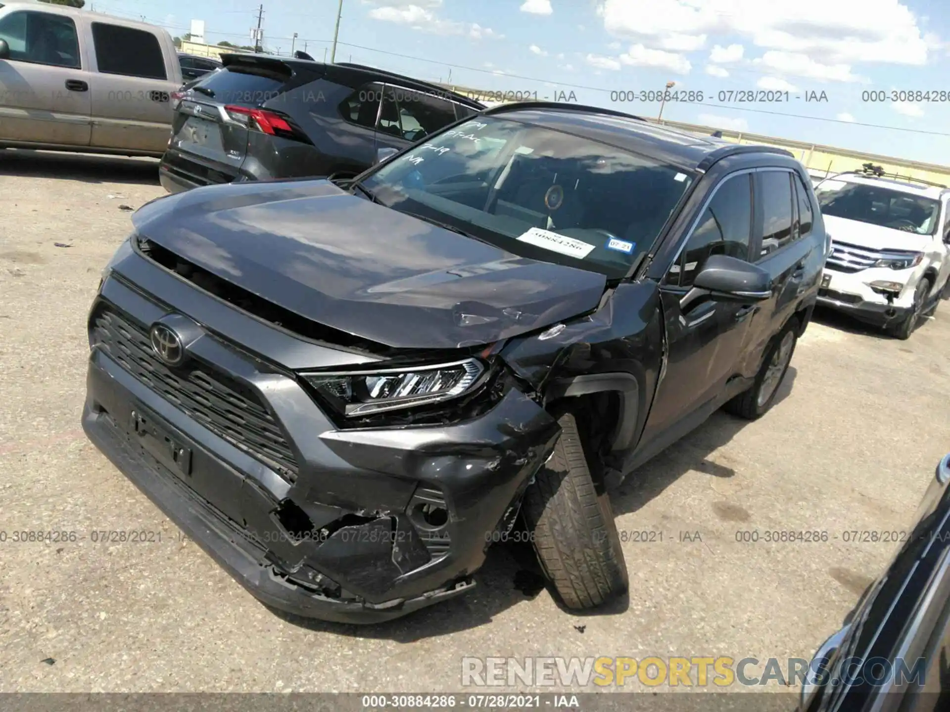 2 Photograph of a damaged car JTMC1RFV3KJ014067 TOYOTA RAV4 2019