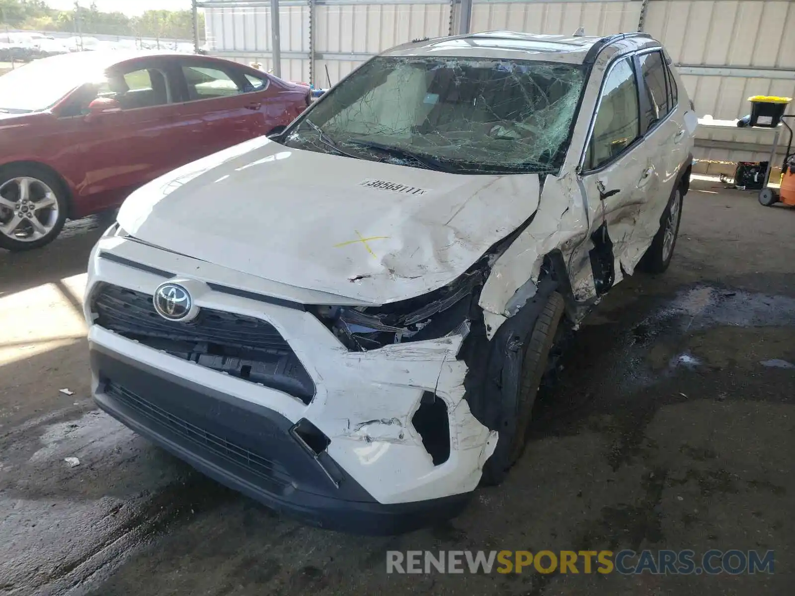 2 Photograph of a damaged car JTMC1RFV3KJ014571 TOYOTA RAV4 2019