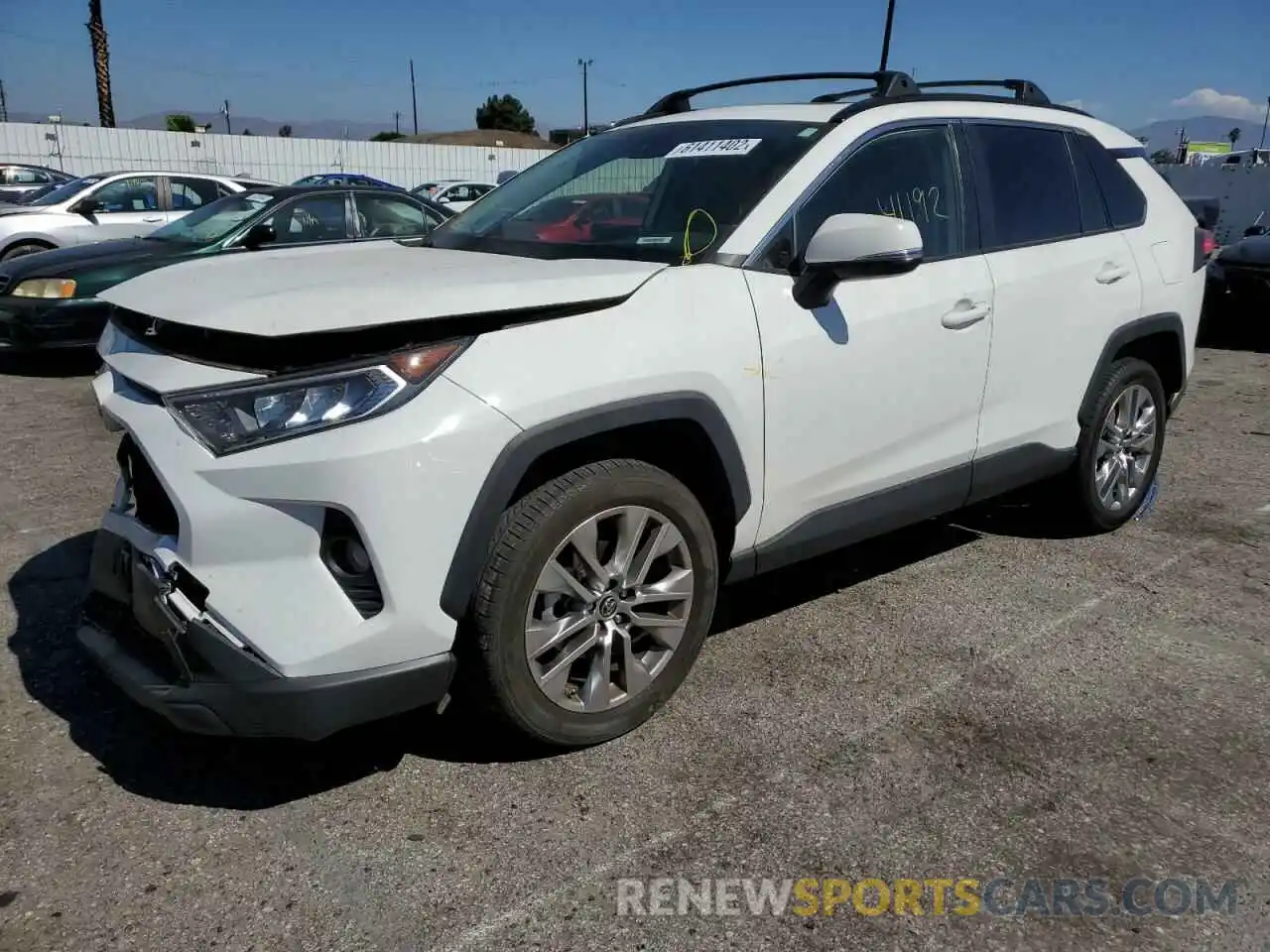 2 Фотография поврежденного автомобиля JTMC1RFV9KD027095 TOYOTA RAV4 2019