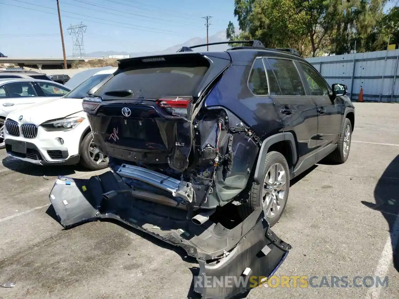 4 Photograph of a damaged car JTMC1RFVXKD508800 TOYOTA RAV4 2019