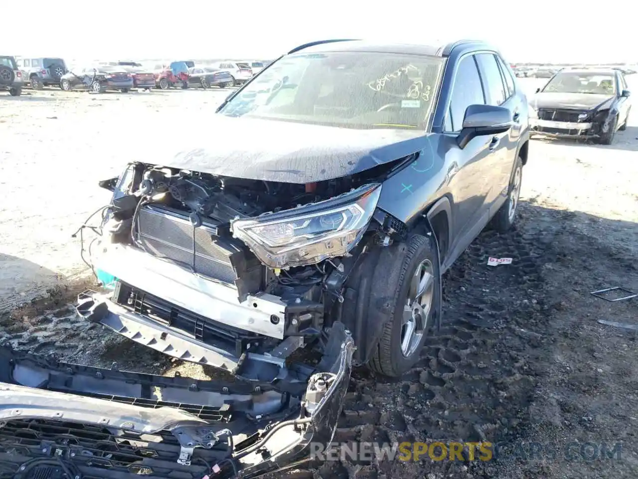 2 Фотография поврежденного автомобиля JTMDWRFV1KD523062 TOYOTA RAV4 2019