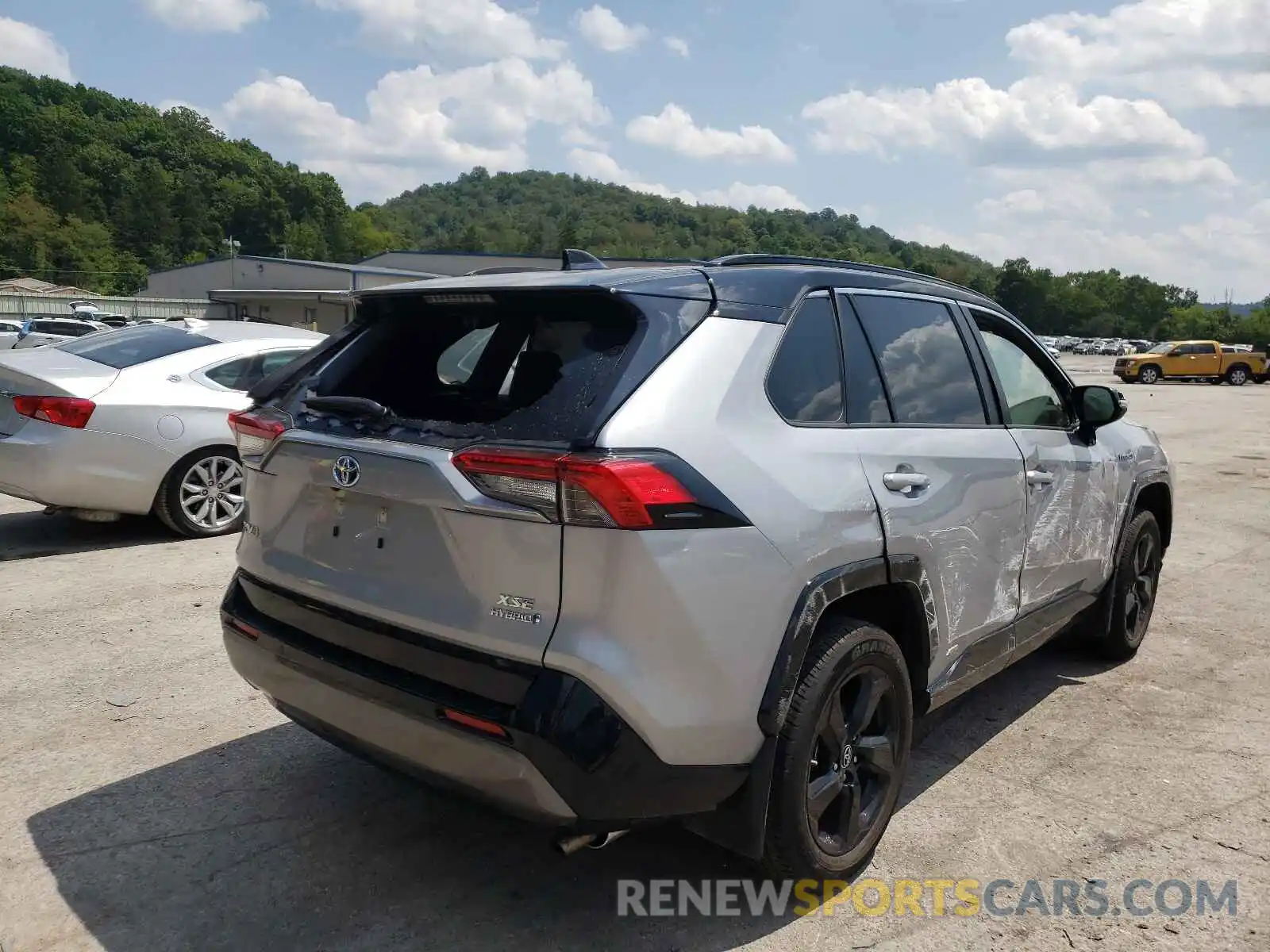 4 Photograph of a damaged car JTMEWRFV1KD514009 TOYOTA RAV4 2019