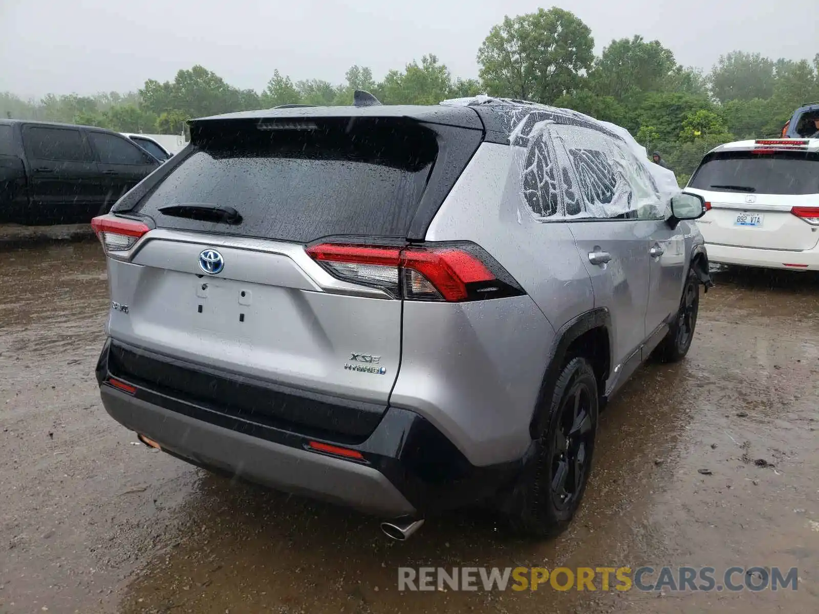 4 Photograph of a damaged car JTMEWRFV1KD518237 TOYOTA RAV4 2019