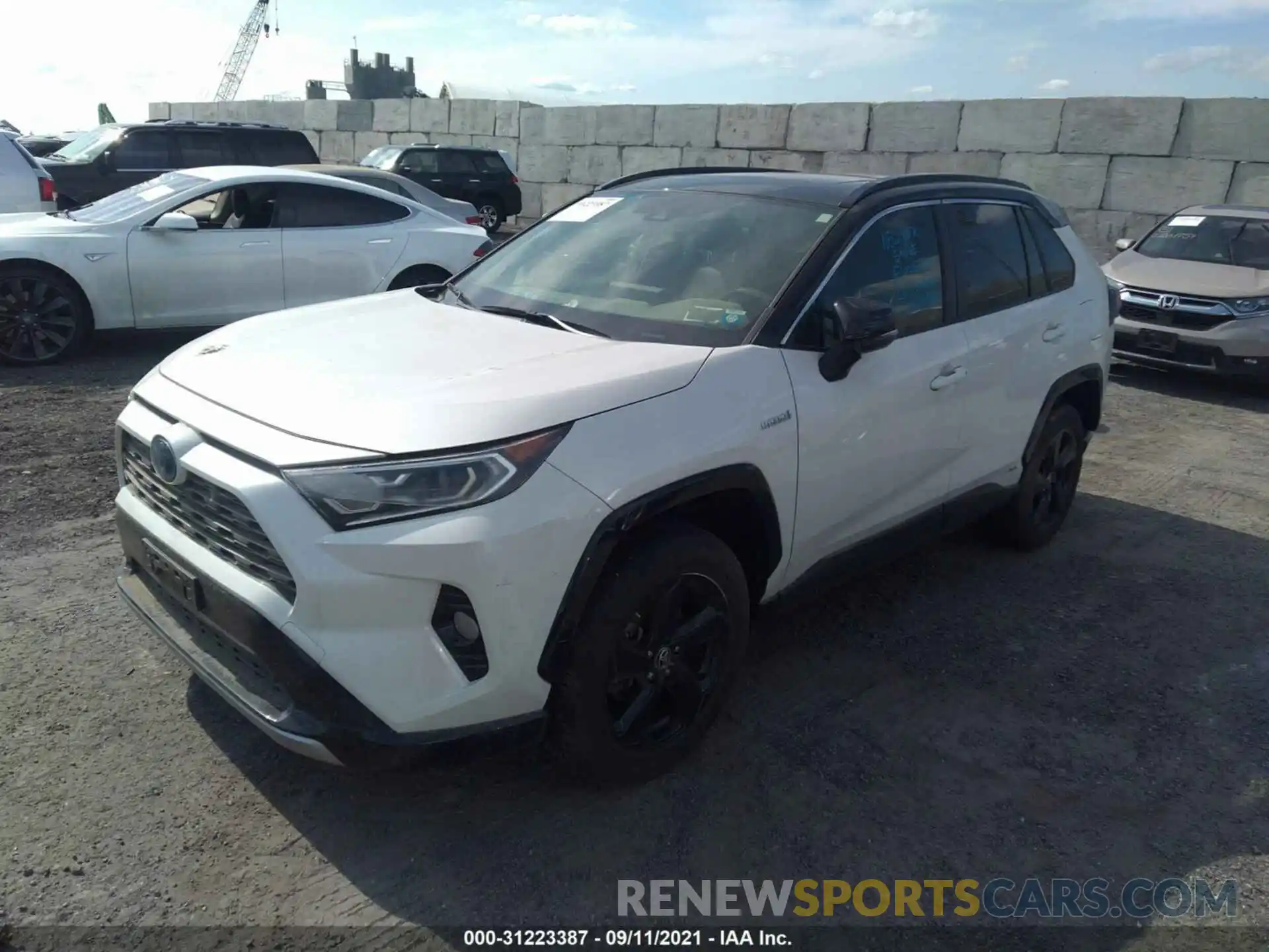 2 Photograph of a damaged car JTMEWRFV8KJ026824 TOYOTA RAV4 2019