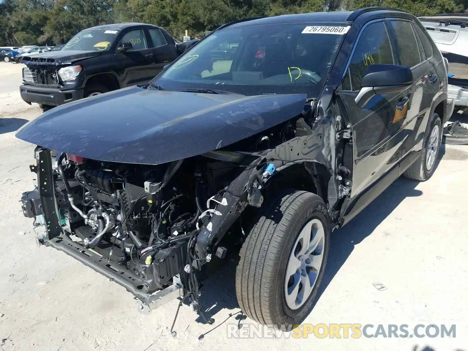 2 Photograph of a damaged car JTMH1RFV0KD034247 TOYOTA RAV4 2019