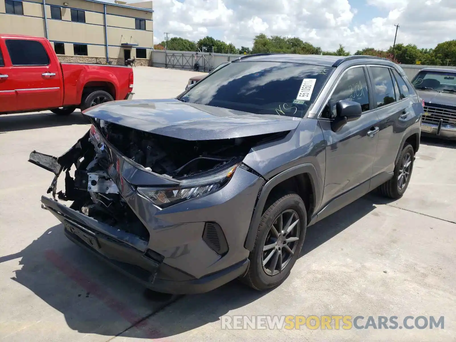 2 Photograph of a damaged car JTMH1RFV0KD512652 TOYOTA RAV4 2019