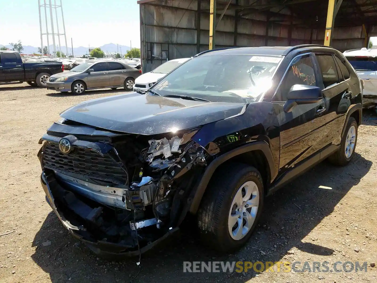 2 Photograph of a damaged car JTMH1RFV0KJ003985 TOYOTA RAV4 2019