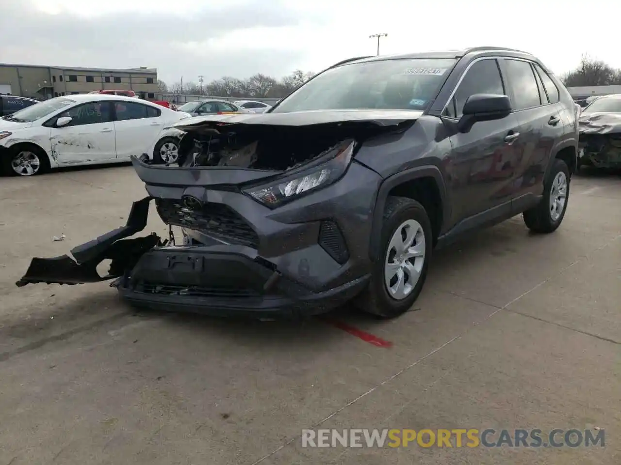 2 Photograph of a damaged car JTMH1RFV0KJ006580 TOYOTA RAV4 2019