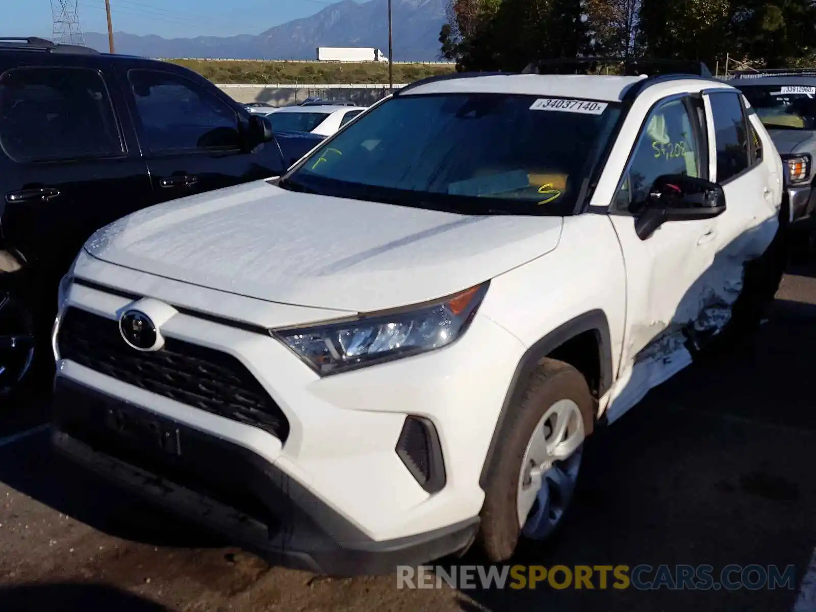 2 Photograph of a damaged car JTMH1RFV1KD506472 TOYOTA RAV4 2019