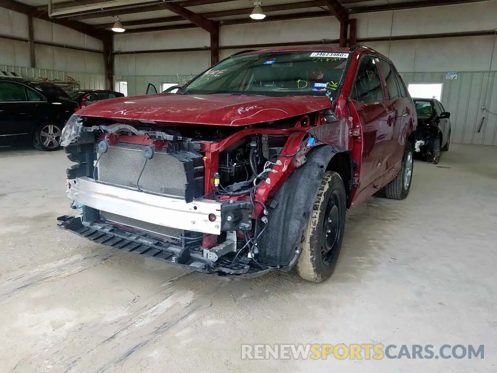 2 Photograph of a damaged car JTMH1RFV1KJ002599 TOYOTA RAV4 2019