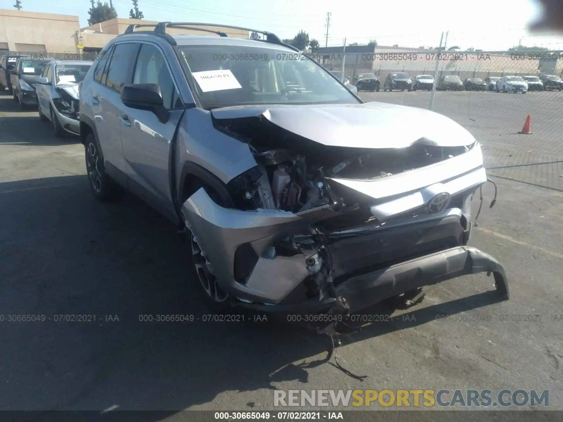 1 Photograph of a damaged car JTMH1RFV2KD512345 TOYOTA RAV4 2019