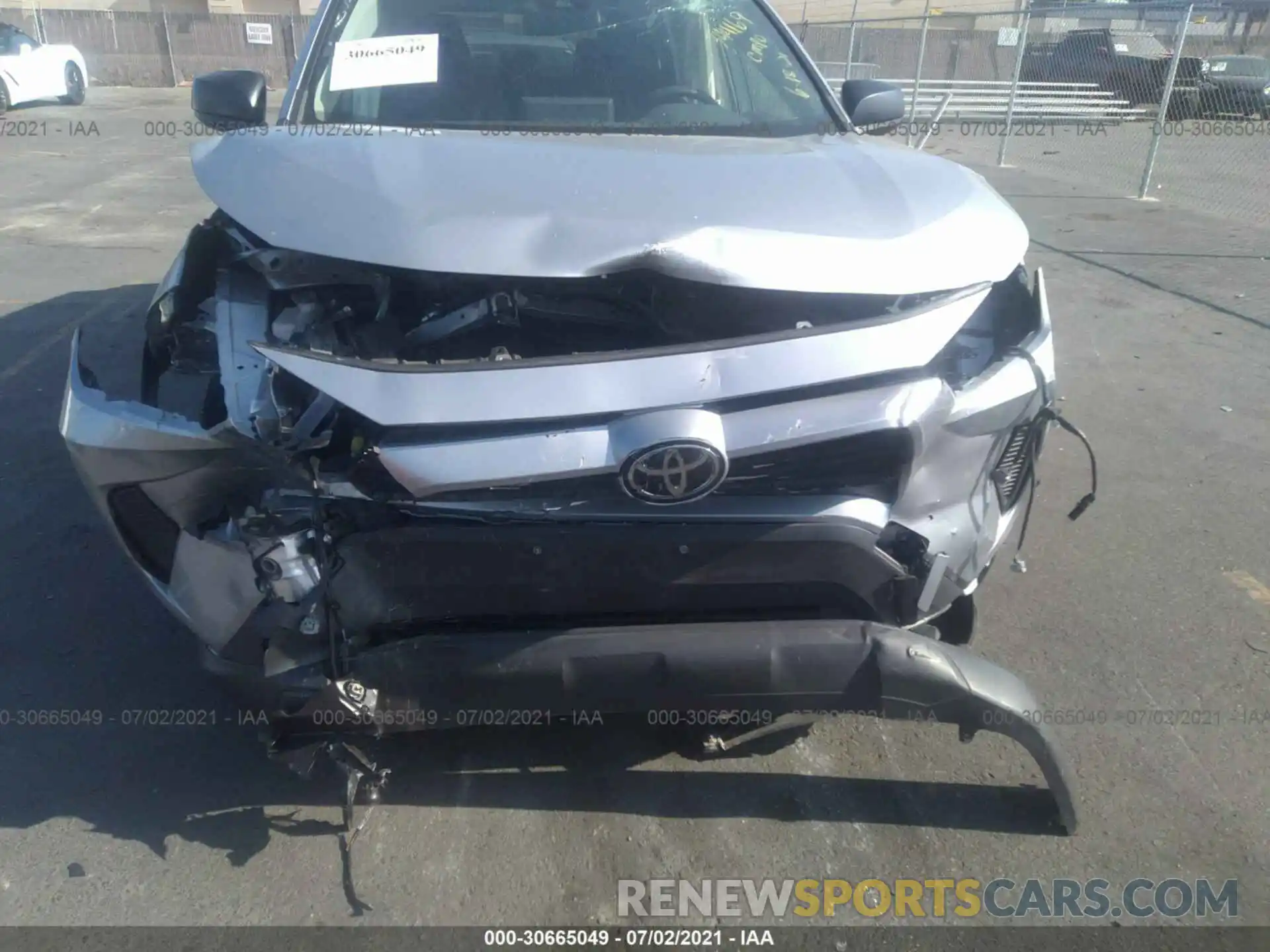 6 Photograph of a damaged car JTMH1RFV2KD512345 TOYOTA RAV4 2019