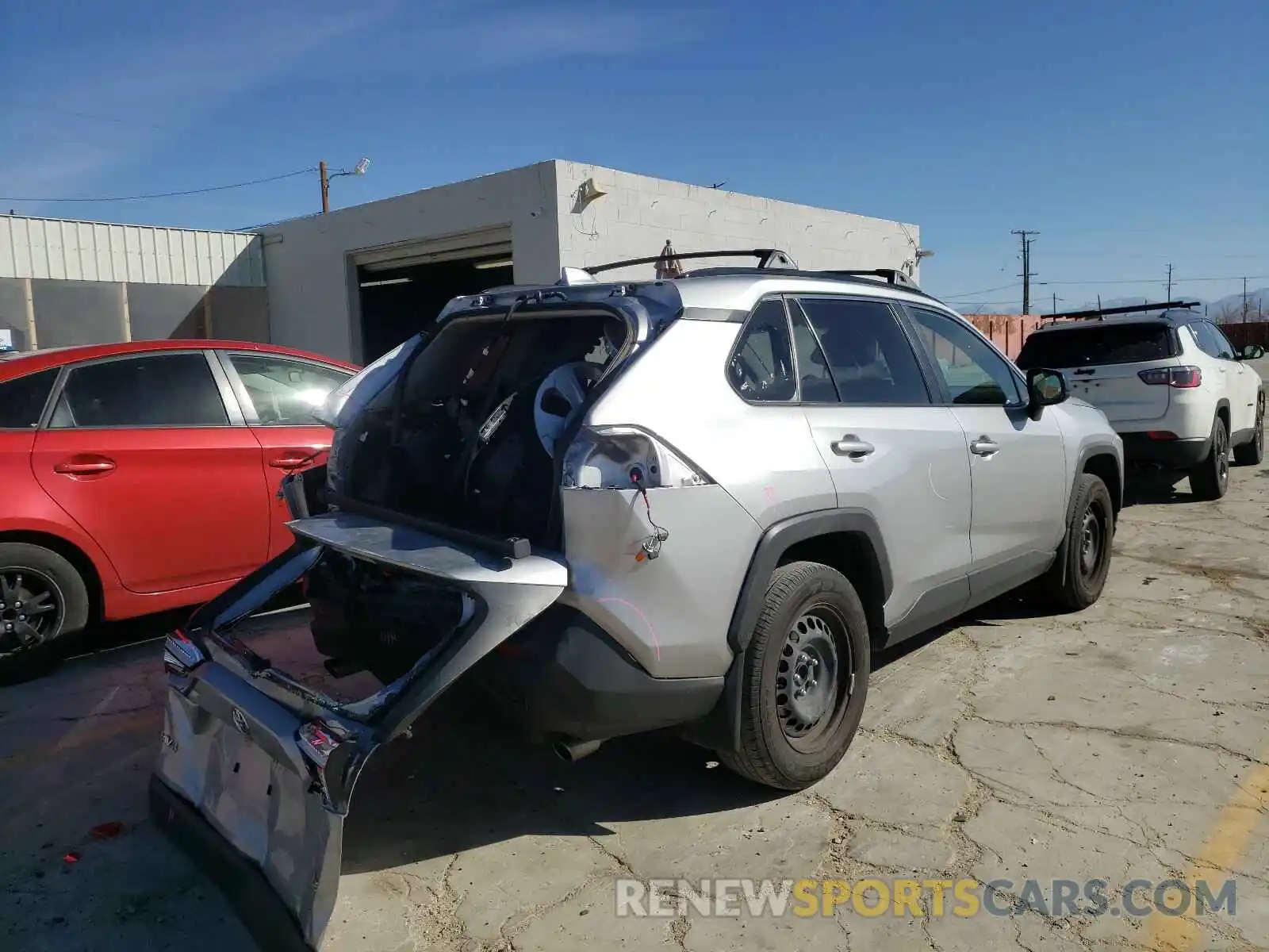 4 Photograph of a damaged car JTMH1RFV2KJ010579 TOYOTA RAV4 2019