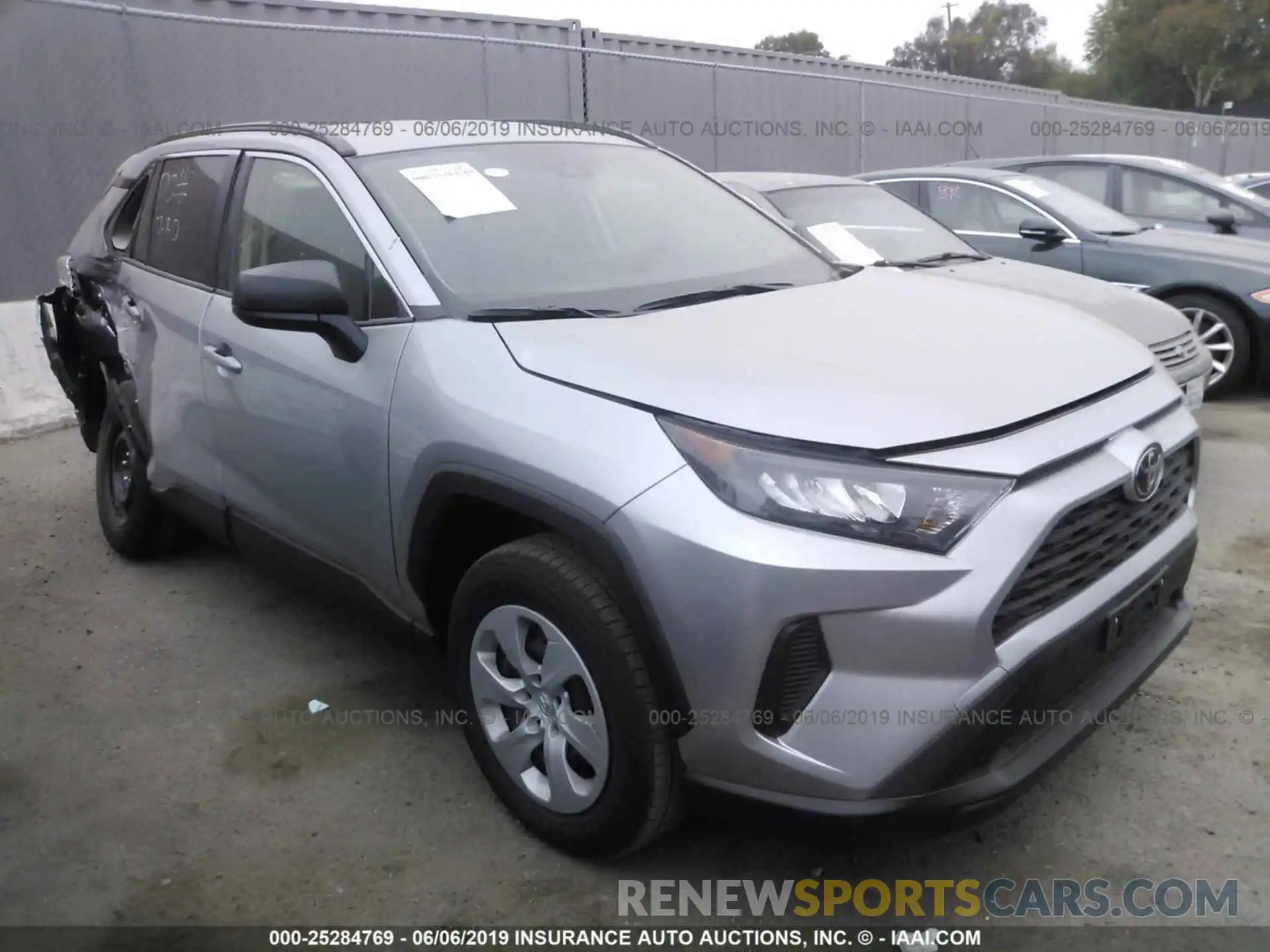 1 Photograph of a damaged car JTMH1RFV3KJ008694 TOYOTA RAV4 2019