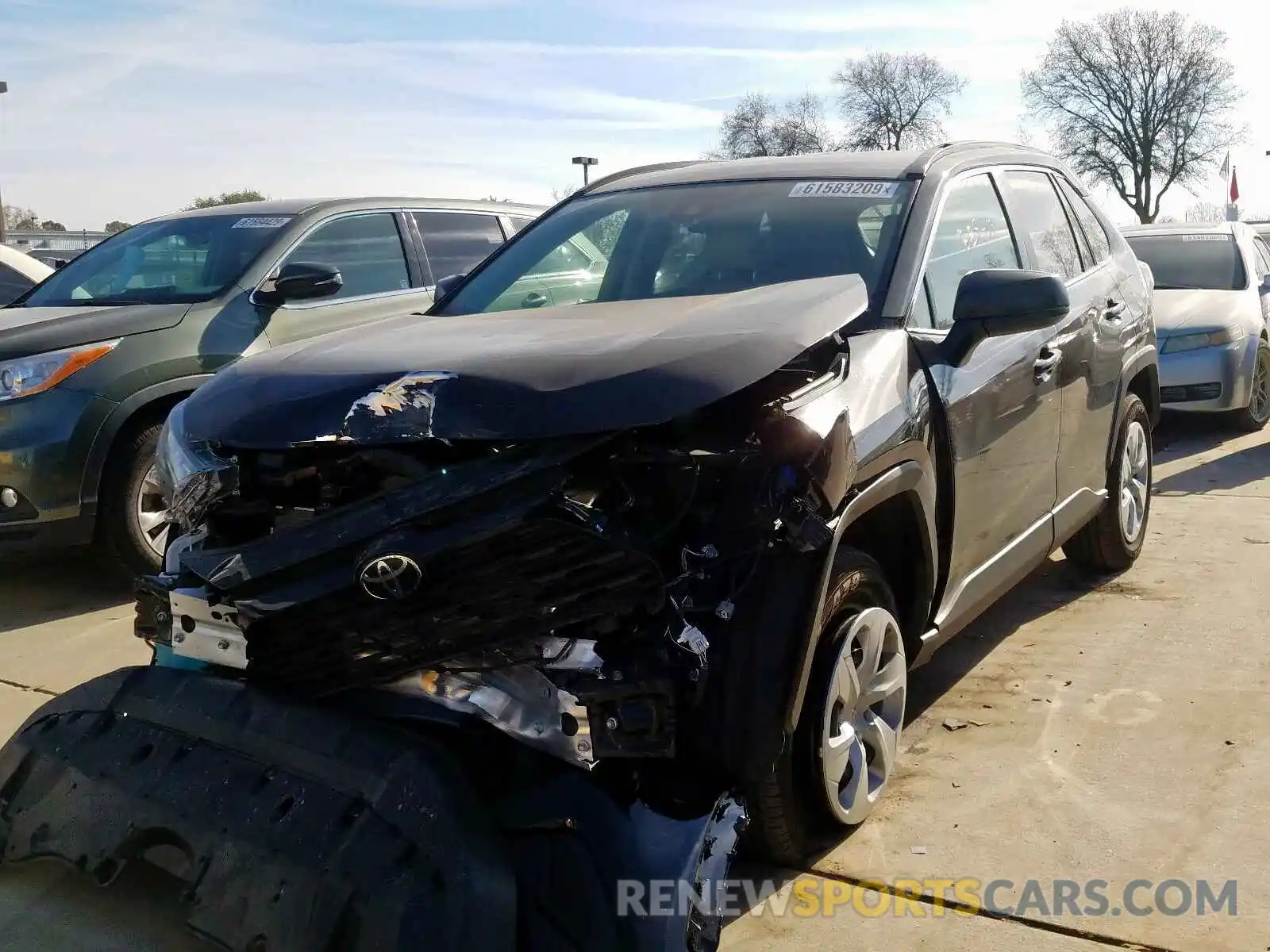 2 Photograph of a damaged car JTMH1RFV3KJ013104 TOYOTA RAV4 2019