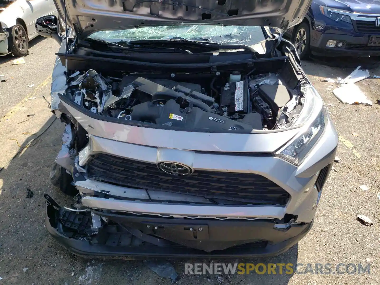 7 Photograph of a damaged car JTMH1RFV4KD013210 TOYOTA RAV4 2019