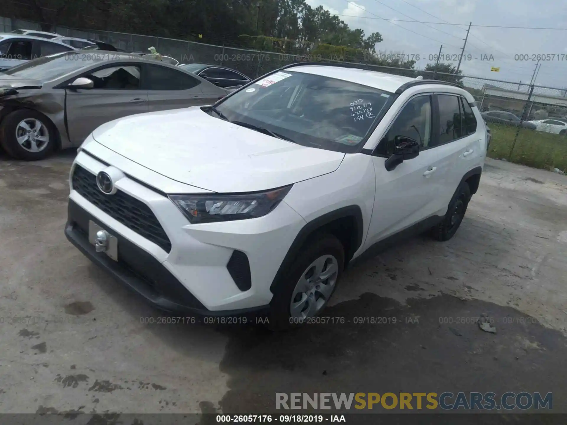 2 Photograph of a damaged car JTMH1RFV6KD501753 TOYOTA RAV4 2019