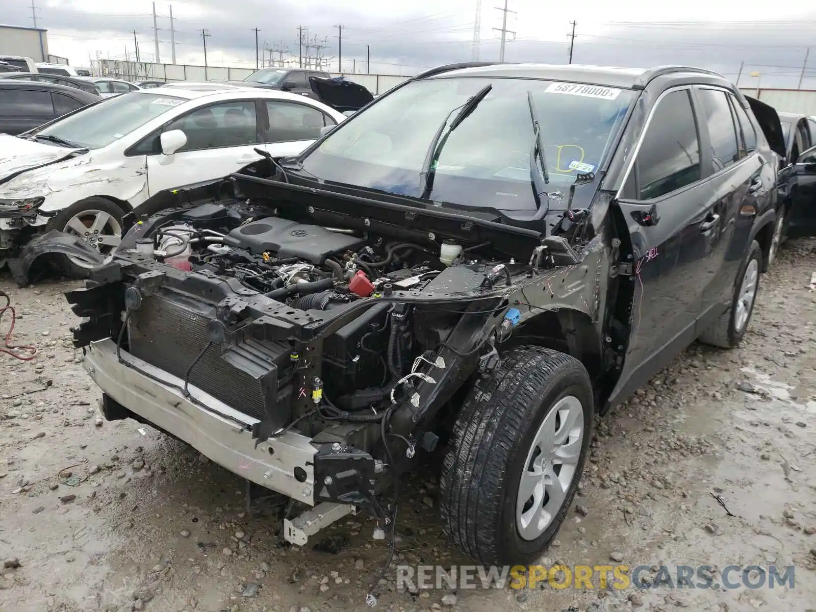 2 Photograph of a damaged car JTMH1RFV6KJ014974 TOYOTA RAV4 2019