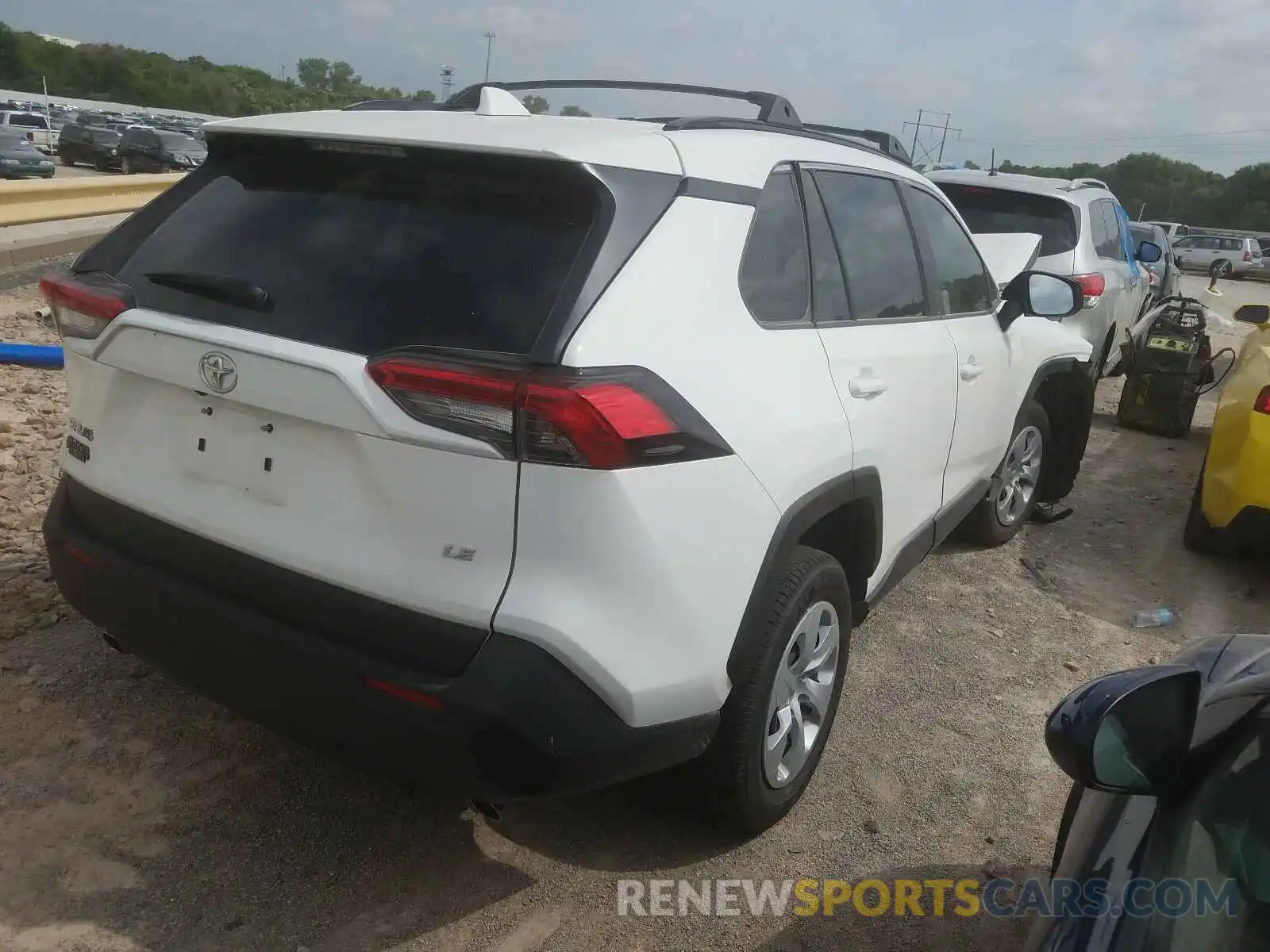 4 Photograph of a damaged car JTMH1RFV7KD014819 TOYOTA RAV4 2019