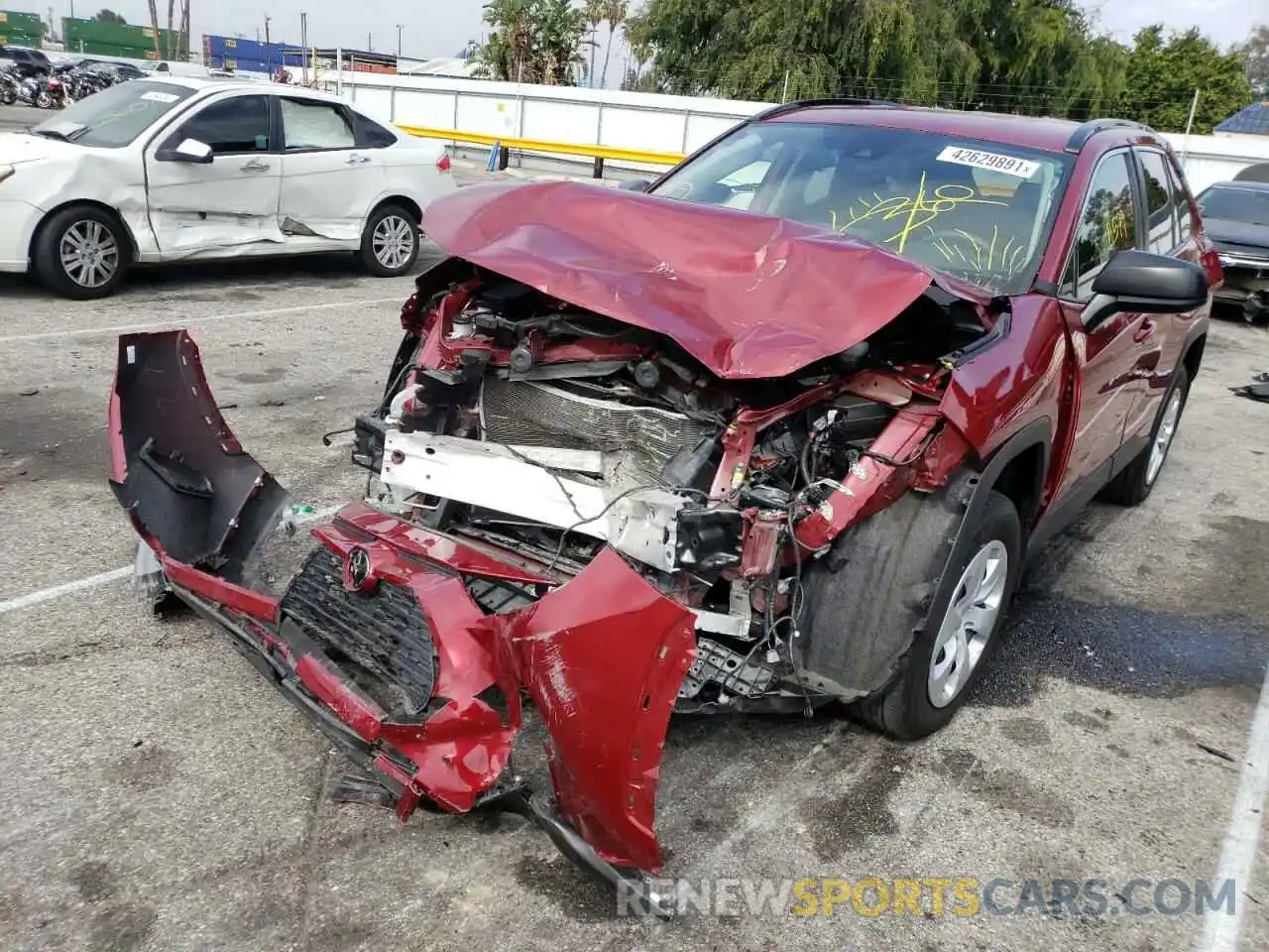 2 Photograph of a damaged car JTMH1RFV8KD023206 TOYOTA RAV4 2019