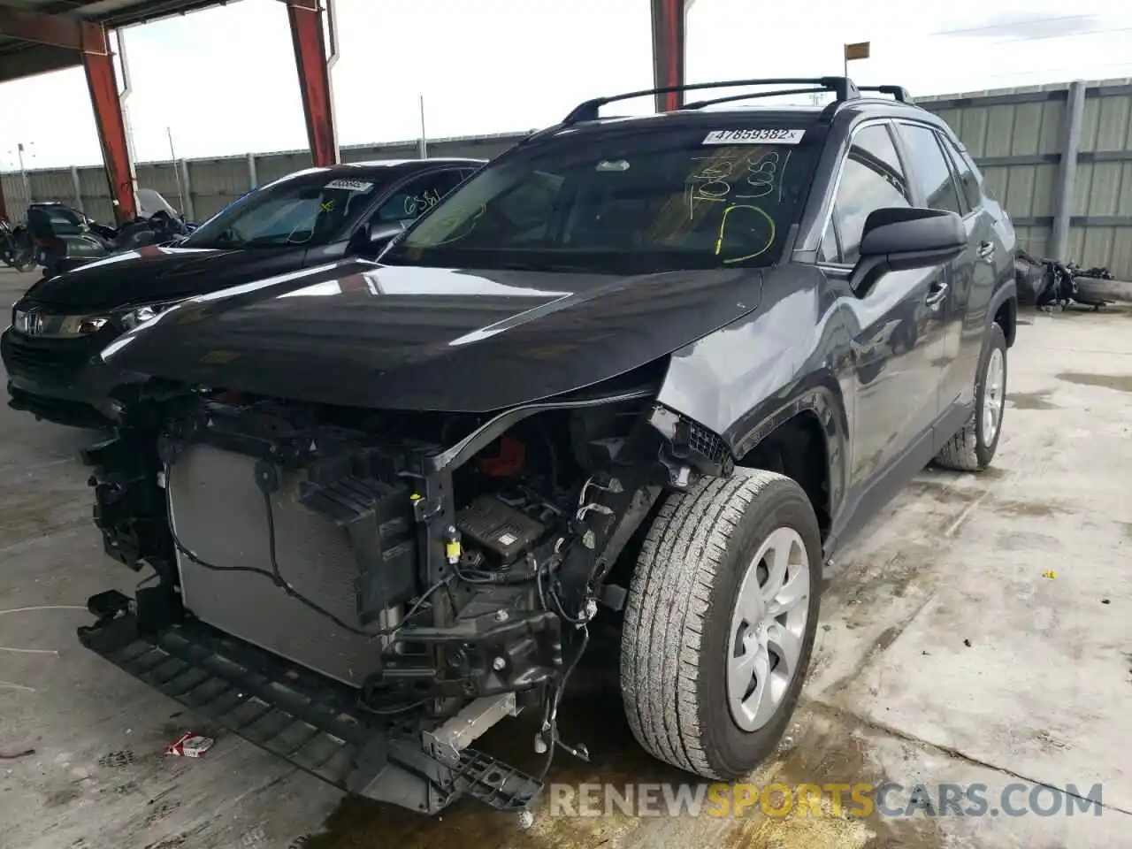 2 Photograph of a damaged car JTMH1RFV9KD501259 TOYOTA RAV4 2019