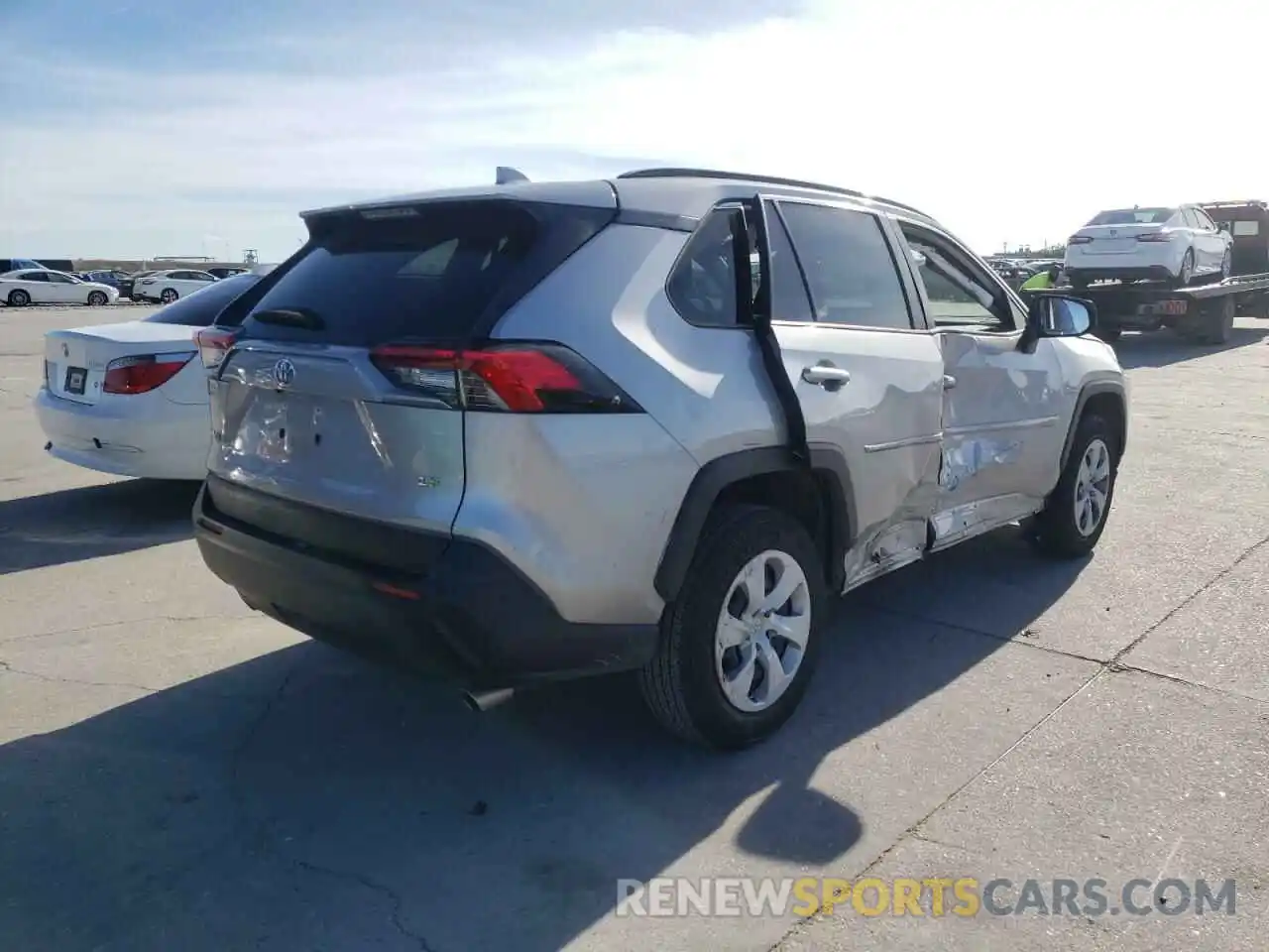 4 Photograph of a damaged car JTMH1RFVXKD025362 TOYOTA RAV4 2019