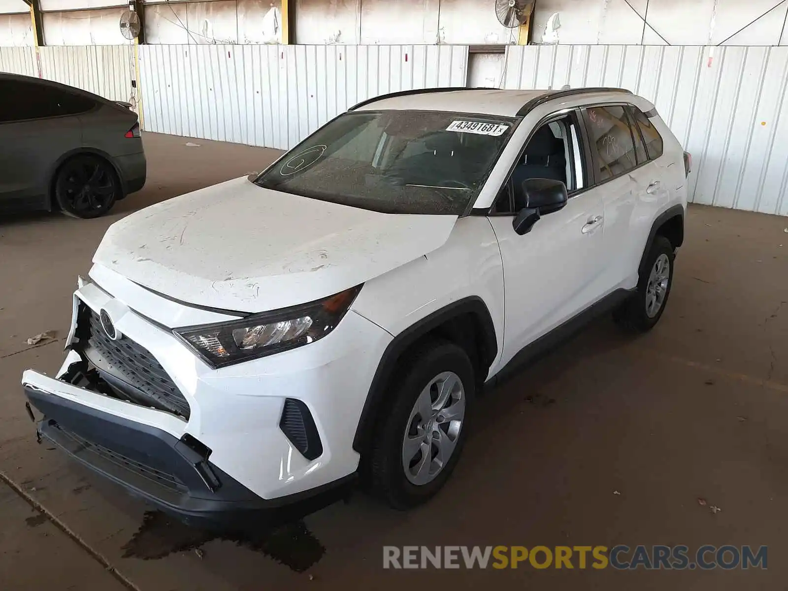 2 Photograph of a damaged car JTMH1RFVXKD509919 TOYOTA RAV4 2019