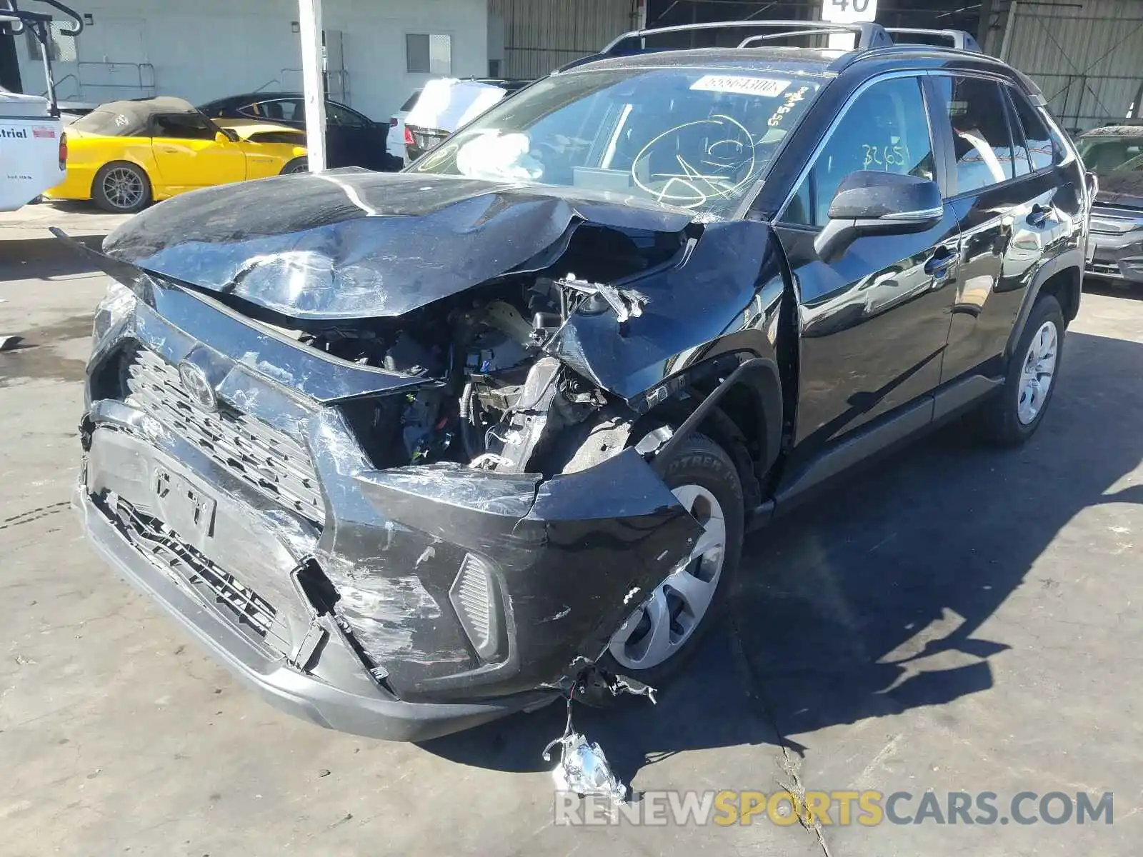 2 Photograph of a damaged car JTMK1RFV6KD017474 TOYOTA RAV4 2019