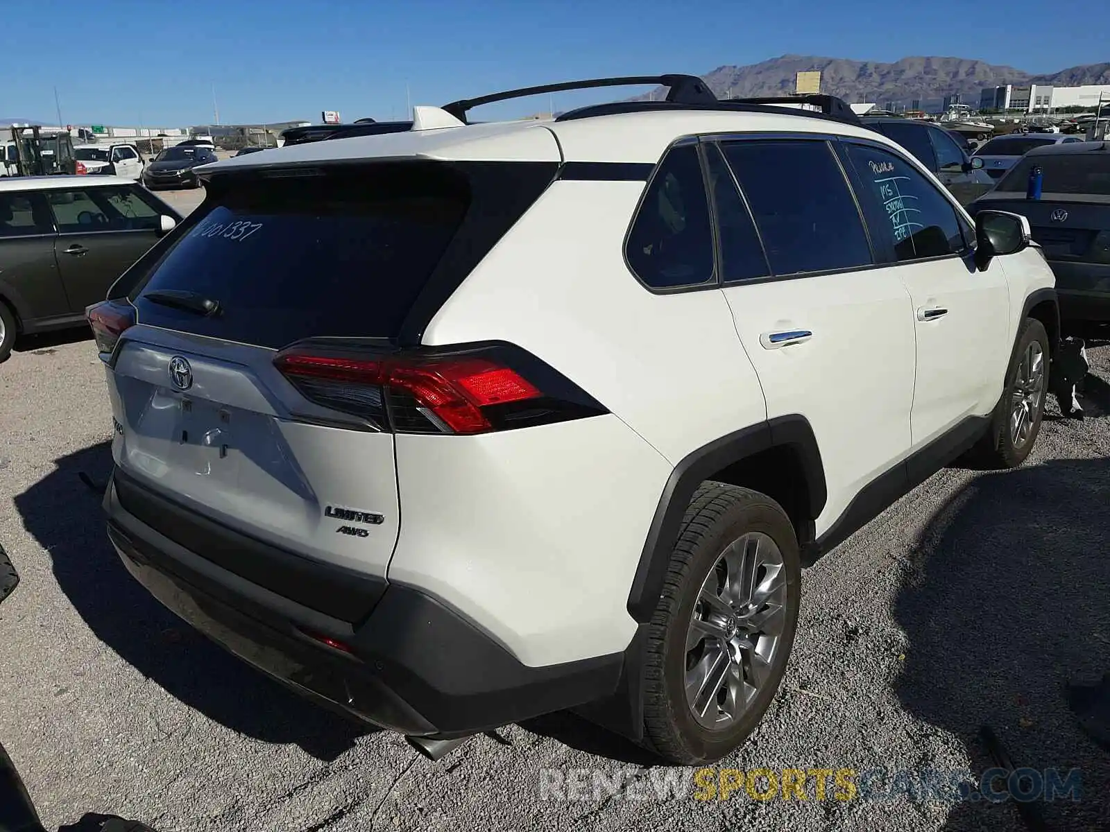 4 Photograph of a damaged car JTMN1RFV1KJ023200 TOYOTA RAV4 2019