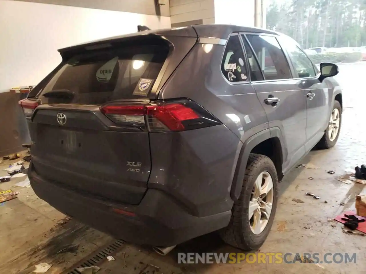 4 Photograph of a damaged car JTMP1RFV0KD007366 TOYOTA RAV4 2019