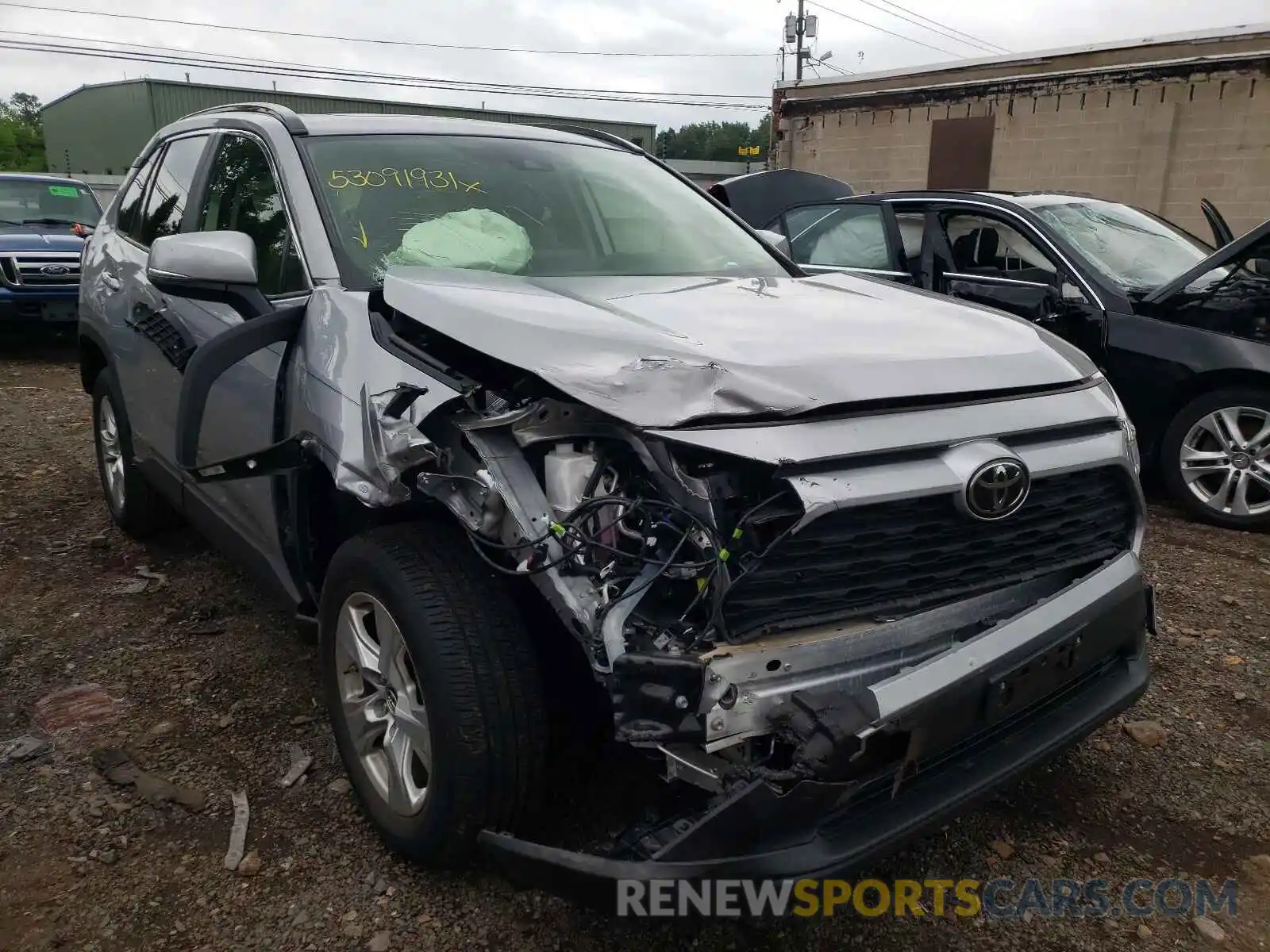 1 Photograph of a damaged car JTMP1RFV0KD011563 TOYOTA RAV4 2019