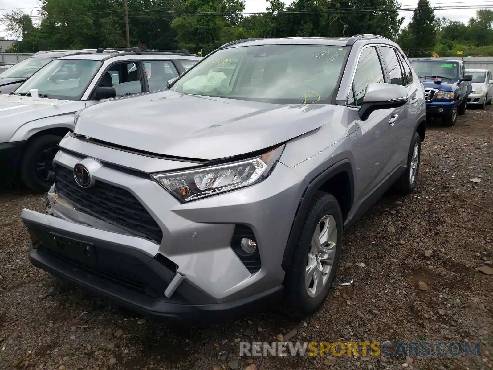 2 Photograph of a damaged car JTMP1RFV0KD011563 TOYOTA RAV4 2019