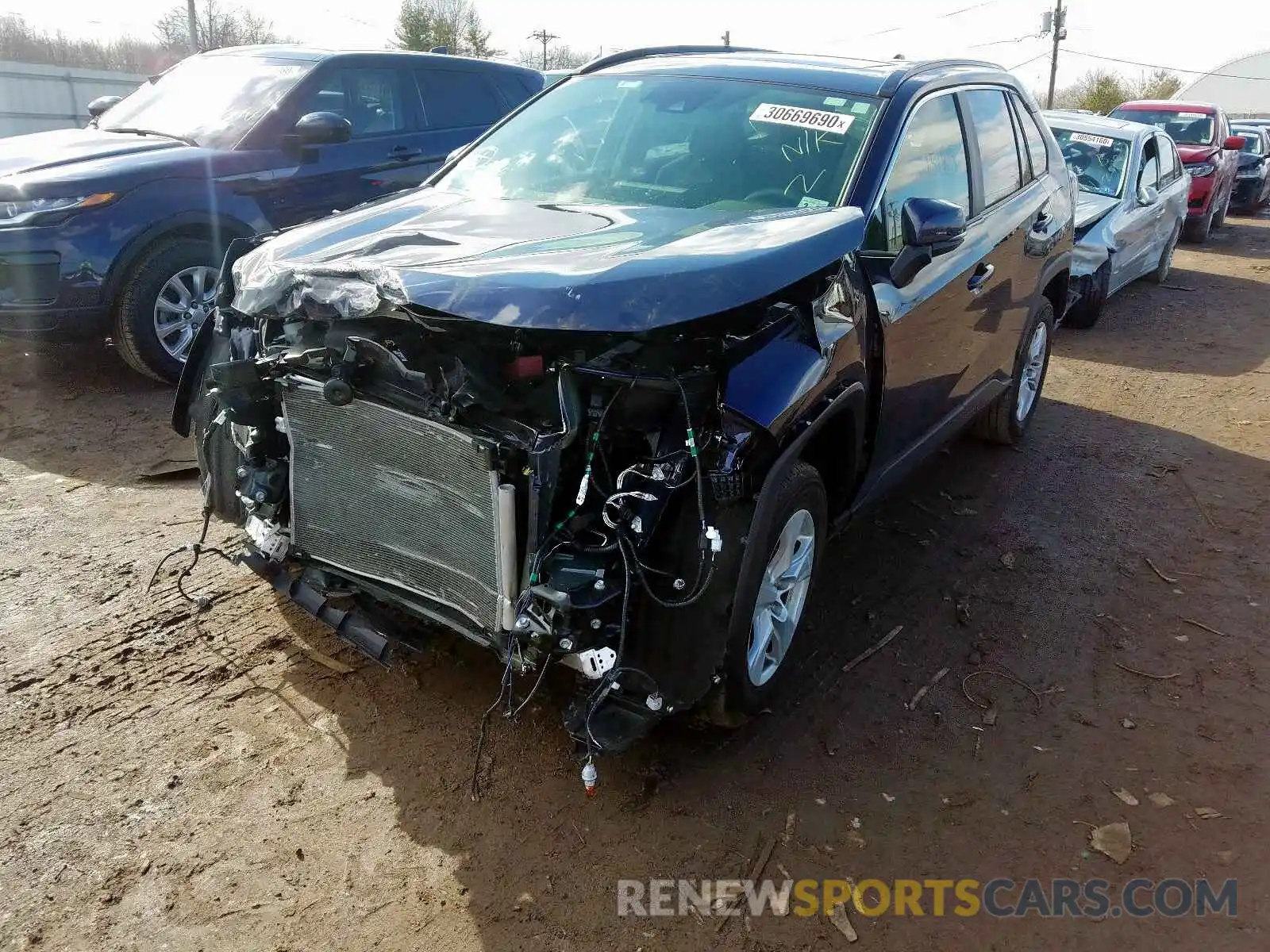 2 Photograph of a damaged car JTMP1RFV0KD012471 TOYOTA RAV4 2019