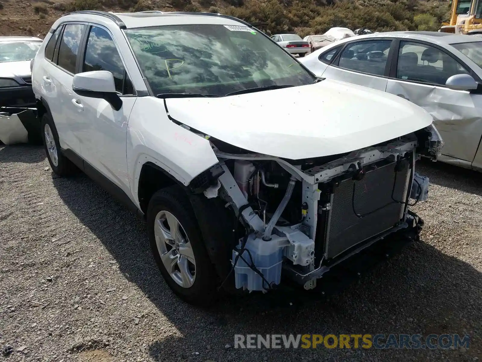 1 Photograph of a damaged car JTMP1RFV0KD031487 TOYOTA RAV4 2019