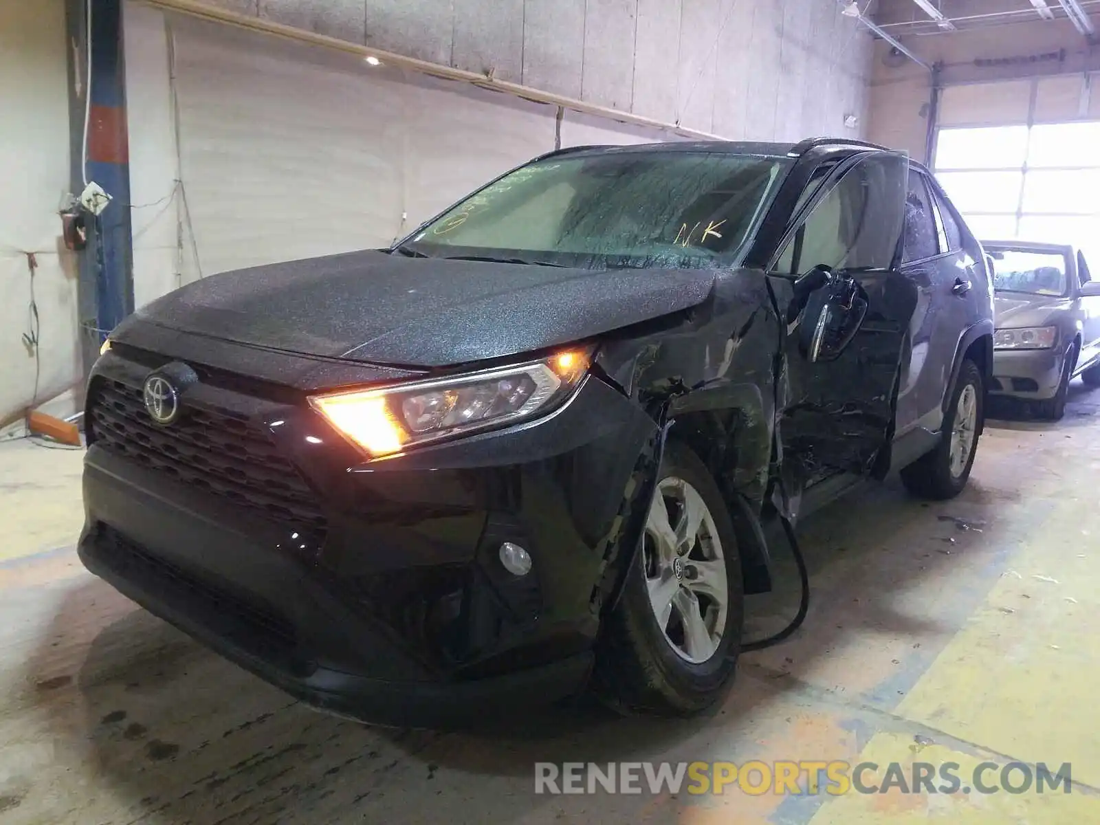 2 Photograph of a damaged car JTMP1RFV0KD040822 TOYOTA RAV4 2019