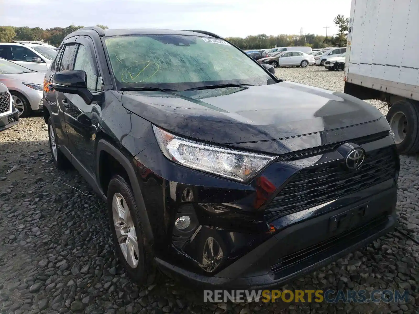 1 Photograph of a damaged car JTMP1RFV0KJ009619 TOYOTA RAV4 2019