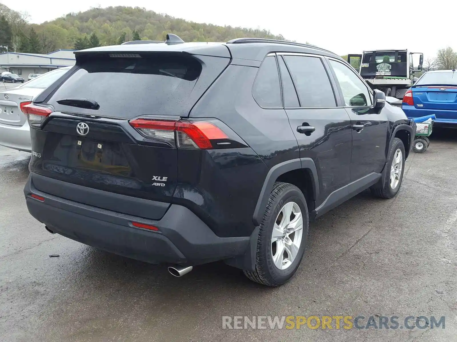 4 Photograph of a damaged car JTMP1RFV1KD038125 TOYOTA RAV4 2019