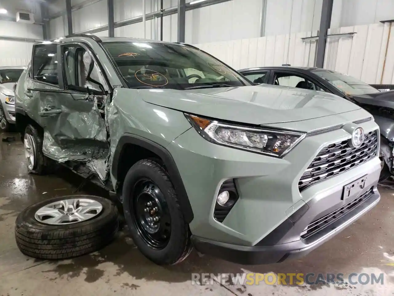 1 Photograph of a damaged car JTMP1RFV1KJ002730 TOYOTA RAV4 2019