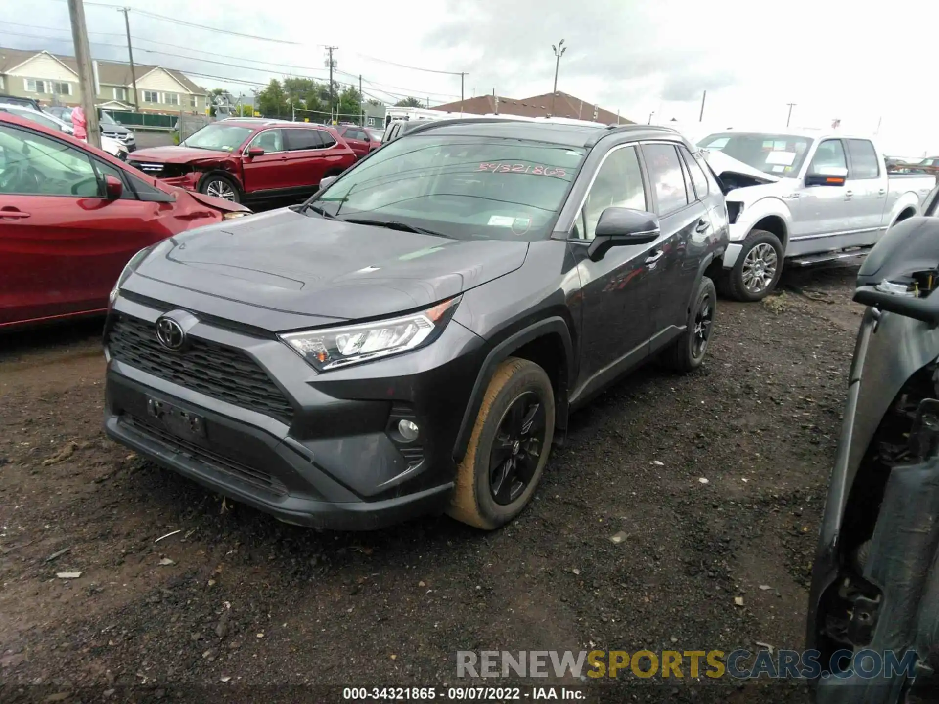 2 Photograph of a damaged car JTMP1RFV1KJ004395 TOYOTA RAV4 2019