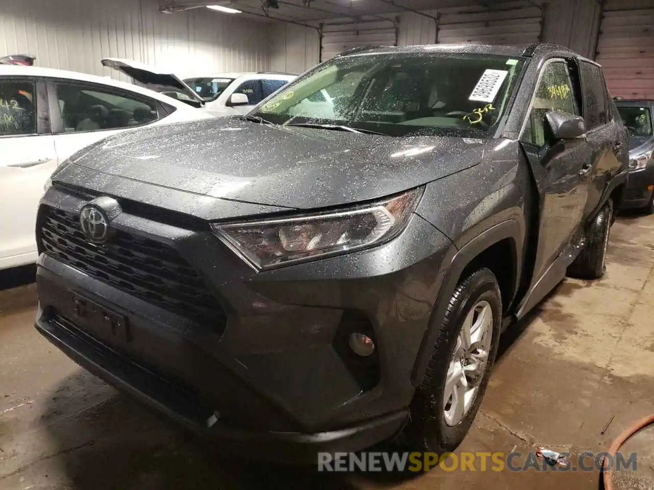 2 Photograph of a damaged car JTMP1RFV2KD008809 TOYOTA RAV4 2019