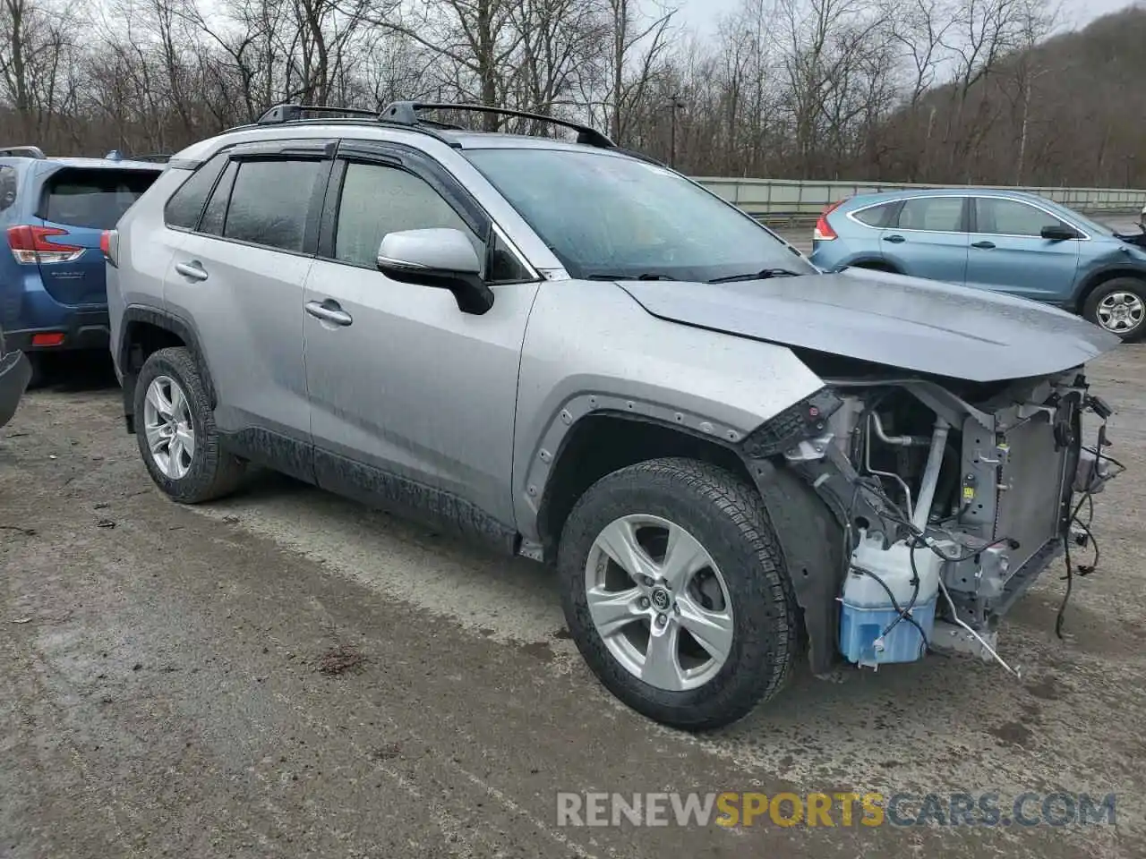 4 Photograph of a damaged car JTMP1RFV3KD021651 TOYOTA RAV4 2019