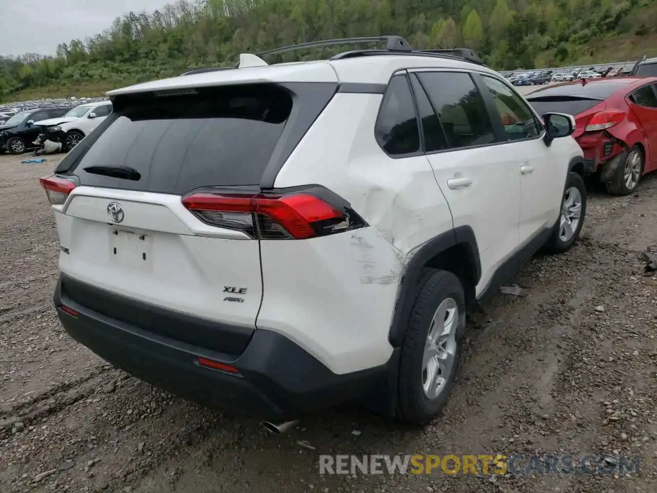 4 Photograph of a damaged car JTMP1RFV3KD023240 TOYOTA RAV4 2019