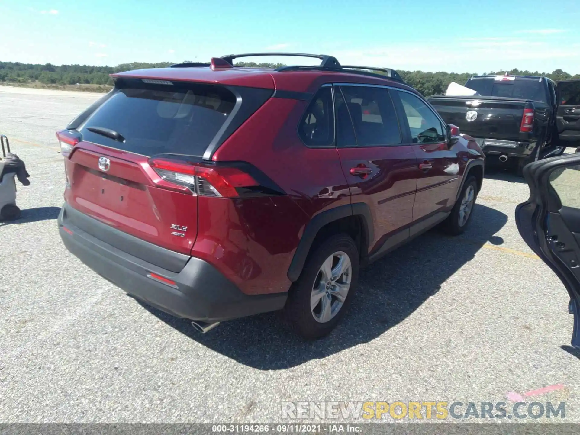 4 Photograph of a damaged car JTMP1RFV3KD033153 TOYOTA RAV4 2019