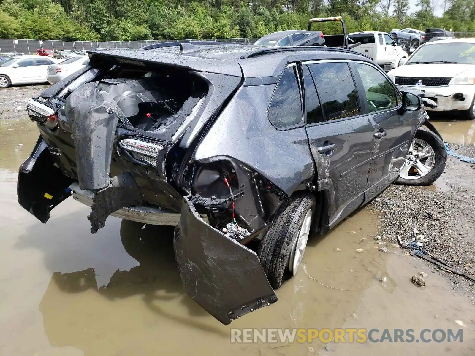 4 Photograph of a damaged car JTMP1RFV3KD039504 TOYOTA RAV4 2019