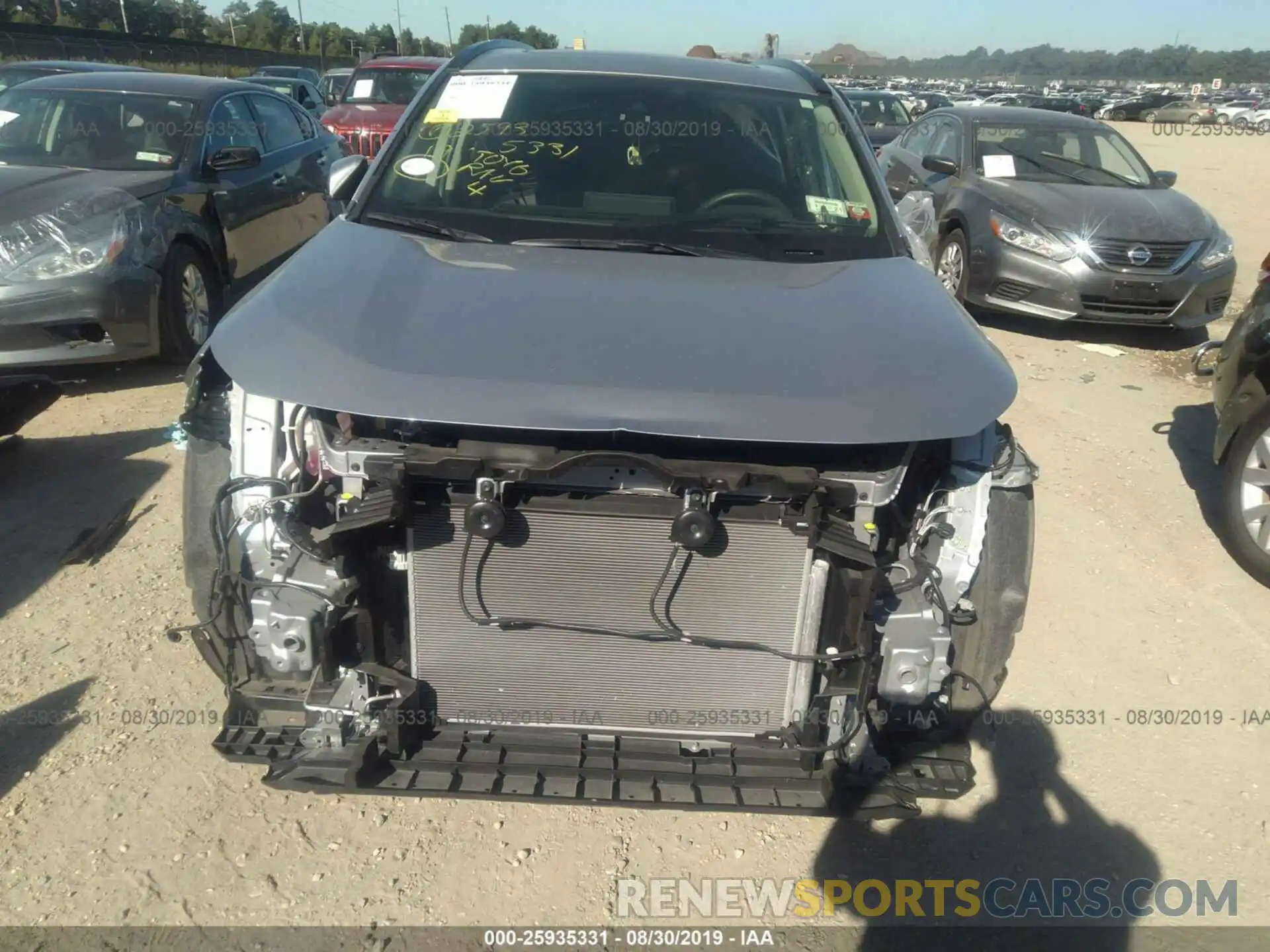 6 Photograph of a damaged car JTMP1RFV3KD500653 TOYOTA RAV4 2019