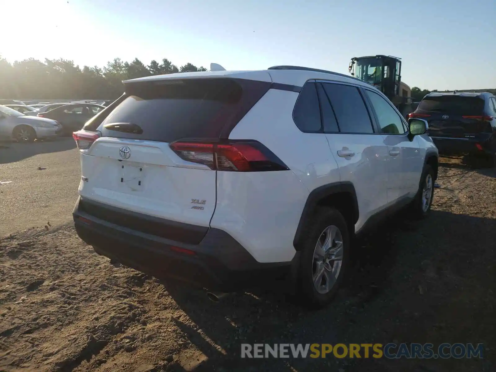 4 Photograph of a damaged car JTMP1RFV3KD523446 TOYOTA RAV4 2019