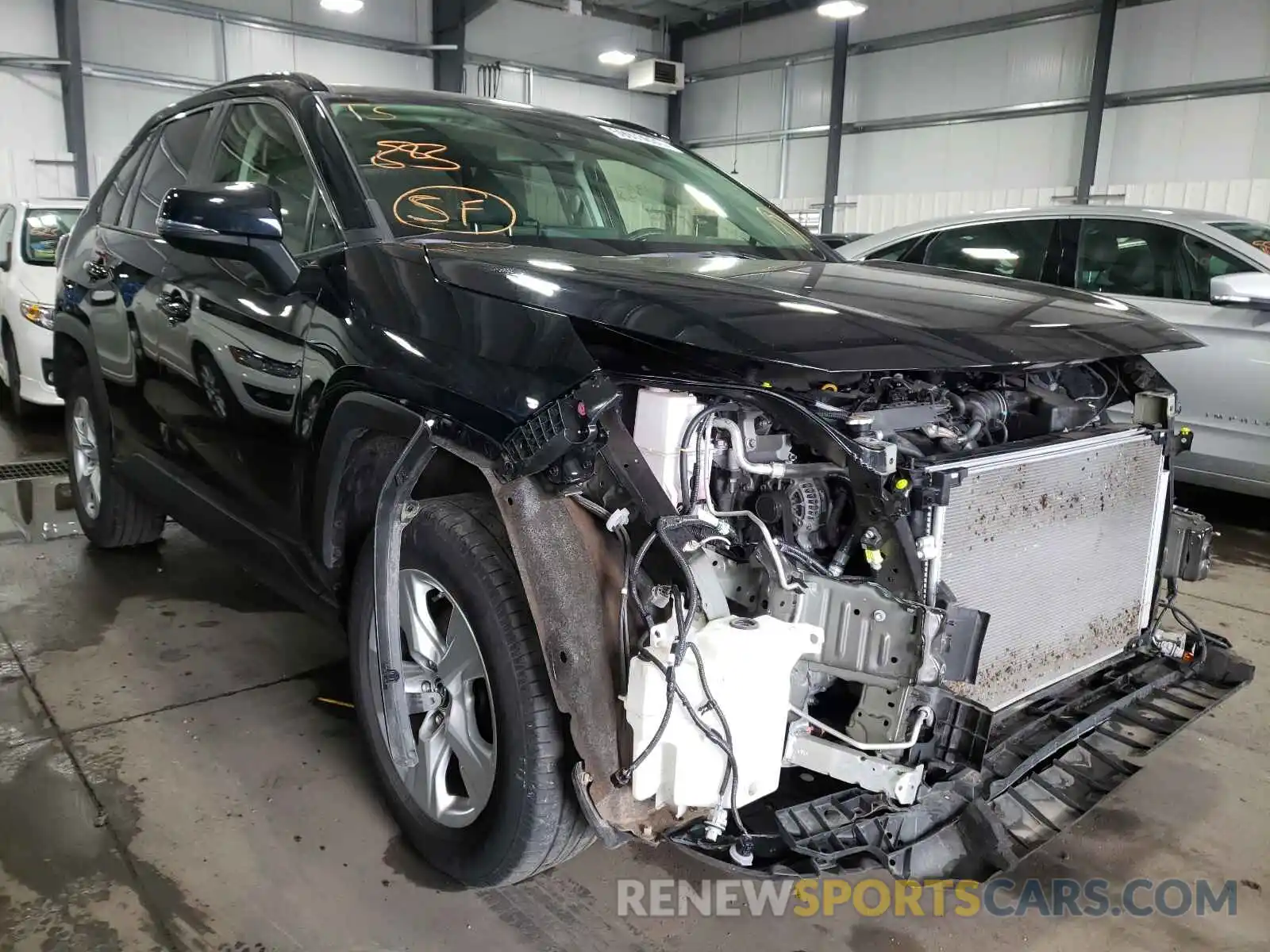 1 Photograph of a damaged car JTMP1RFV4KD012764 TOYOTA RAV4 2019