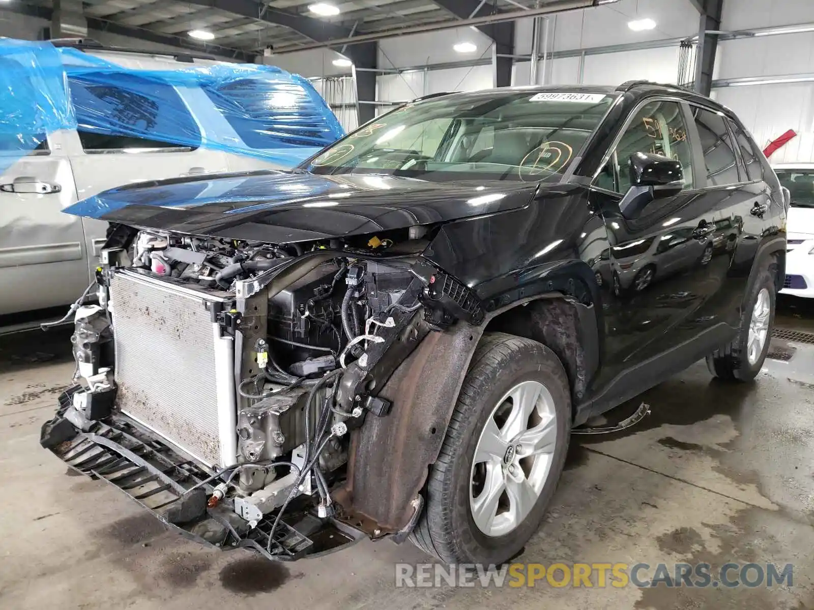 2 Photograph of a damaged car JTMP1RFV4KD012764 TOYOTA RAV4 2019