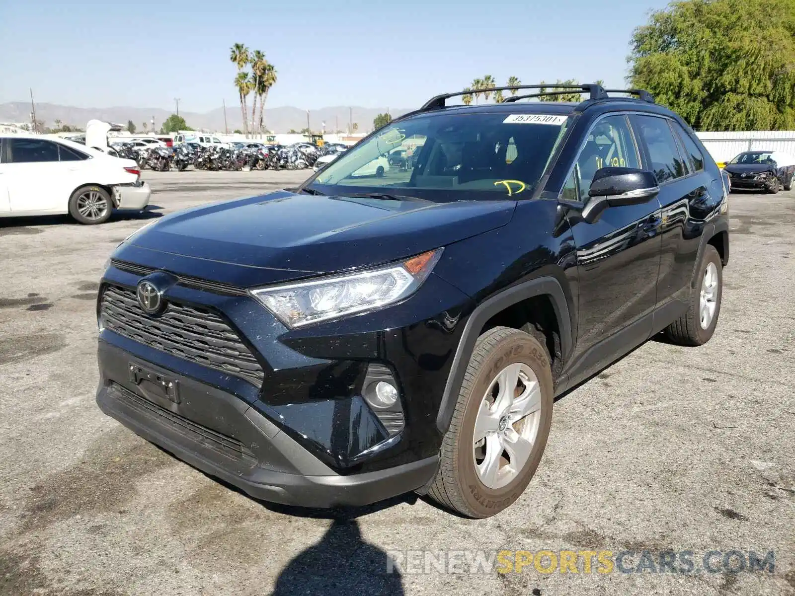 2 Photograph of a damaged car JTMP1RFV4KD018001 TOYOTA RAV4 2019